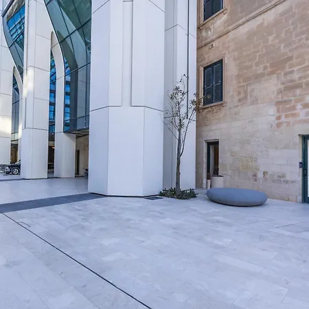 Chic & Cheeky Reside In Malta's Tallest Skyscraper *